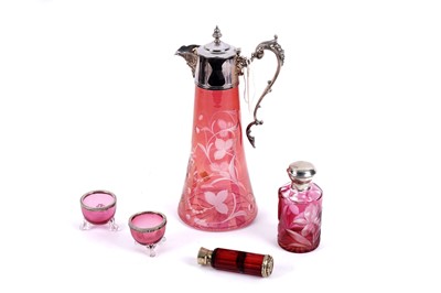 Lot 396 - A Victorian cranberry glass jug; and a selection of silver wares