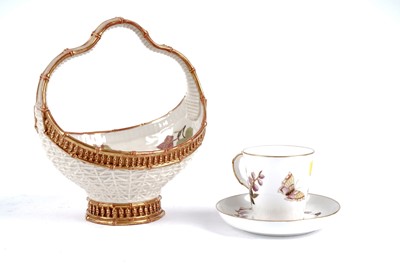 Lot 382 - A coffee can and saucer, and a basket