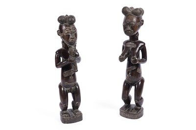 Lot 200 - Baule people: a male/female pair of asie esu asye usu figures