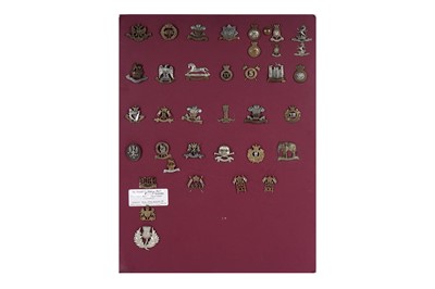 Lot 4 - A display of British Regimental cap badges