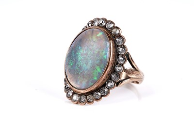 Lot 639 - A Victorian opal and white sapphire cluster ring