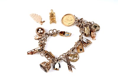 Lot 89 - A 9ct yellow gold charm bracelet