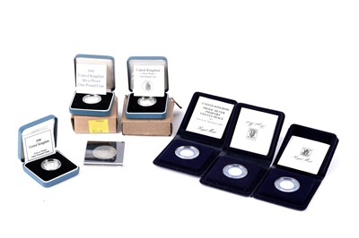 Lot 211 - Six silver proof coins and a United States silver dollar