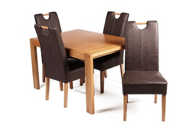 Lot 659 - Ercol: a ‘Bosco’ extending oak dining table; and four matched high back dining chairs