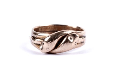 Lot 86 - An Edwardian 9ct rose gold snake pattern dress ring