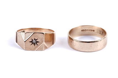 Lot 84 - A star set diamond signet ring; and a gold wedding band