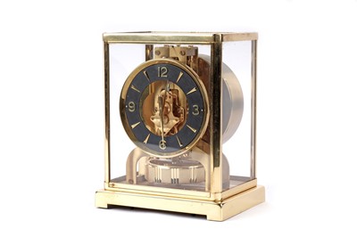 Lot 1224 - Jaeger-LeCoultre Atmos: a lacquered brass cased mantel clock