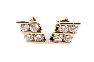 Lot 655 - A pair of diamond earrings