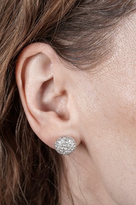 Lot 770 - A pair of diamond earrings
