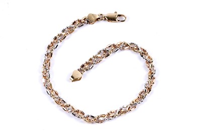 Lot 67 - A tri-colour fancy link chain bracelet