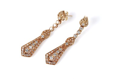 Lot 658 - A pair of diamond drop earrings