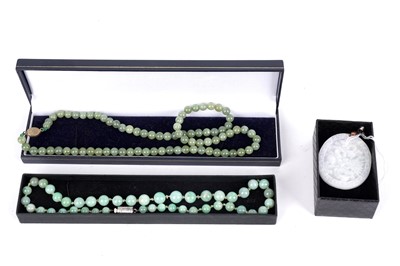 Lot 244 - Two quartz bead necklaces; and a jadeite pendant