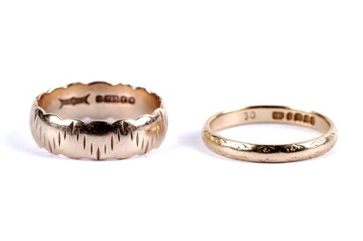Lot 11 - An 18ct yellow gold wedding band; and a 9ct gold wedding band