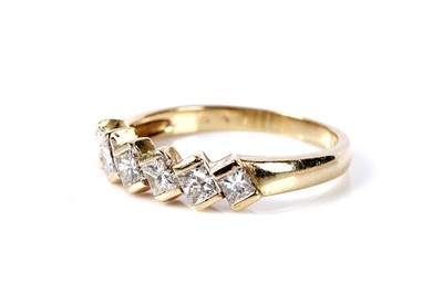 Lot 664 - A six-stone diamond ring