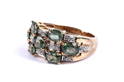 Lot 114 - A green topaz and diamond dress ring
