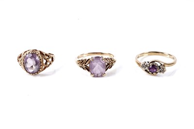 Lot 134 - Three amethyst dress rings