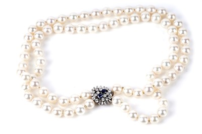 Lot 631 - A double strand cultured pearl necklace retailed by Asprey & Co