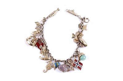 Lot 108 - A yellow gold charm bracelet
