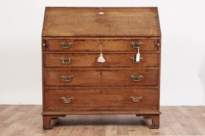 Lot 65 - A George III inlaid oak and walnut banded bureau