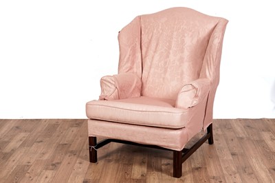 Lot 535 - A Georgian style wingback armchair