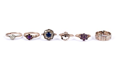 Lot 80 - A collection of gemstone set yellow gold rings; and a tri-colour band