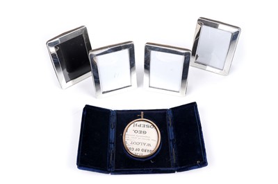 Lot 377 - A cased Victorian portrait miniature frame; and a set of four silver photograph frames