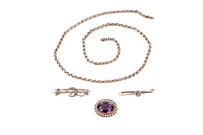 Lot 212 - Three antique gold brooches; and a chain