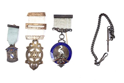 Lot 126 - Three silver Masonic jewels; and a white metal Albert chain
