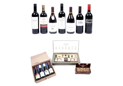 Lot 387 - Seven bottles of red wine; three miniature whisky gift sets
