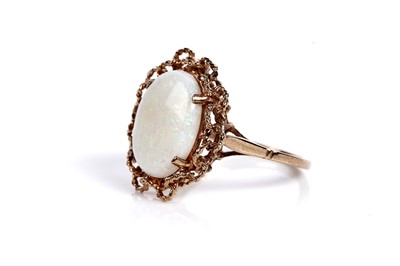 Lot 583 - An opal cabochon cocktail ring