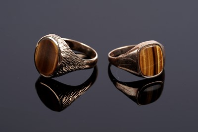 Lot 585 - Two tiger's eye quartz signet rings