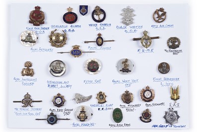 Lot 48 - A display of British and other military lapel badges, sweetheart badges, and other items
