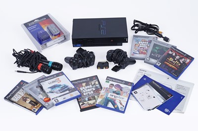 Lot 321 - A PlayStation 2, games and accessories