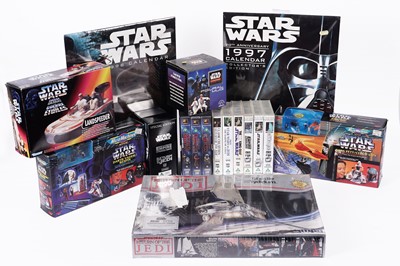 Lot 348 - A selection of Star Wars toys, collectables and videos