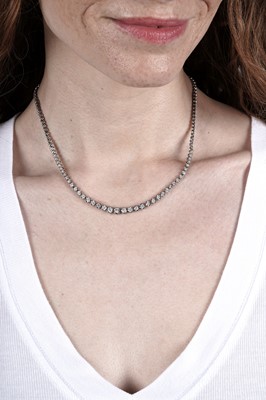 Lot 785 - A diamond line necklace