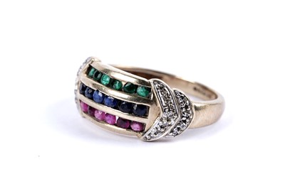 Lot 96 - A ruby, sapphire, emerald and diamond dress ring