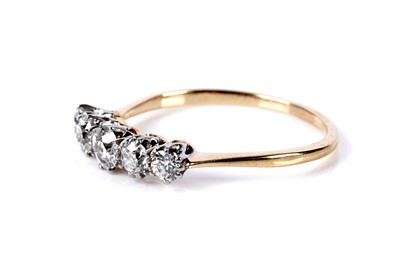 Lot 677 - A five stone diamond ring