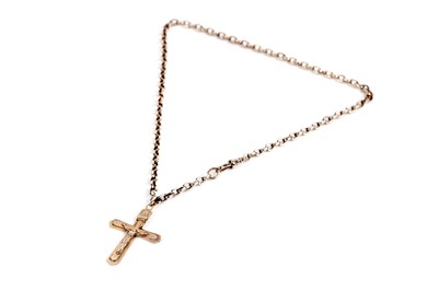 Lot 627 - A gold crucifix pendant on chain
