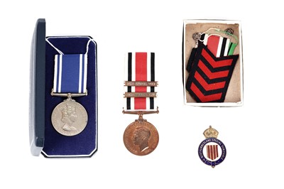 Lot 127 - A George VI Special Constabulary medal, a Police medal and a Special Constable badge