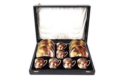 Lot 724 - A cased early 20th Century Japanese export hand-painted tea service