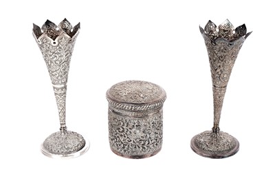 Lot 388 - A pair of Indian Kutch silver vases; and a similar jar