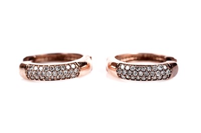 Lot 612 - A pair of diamond hoop earrings
