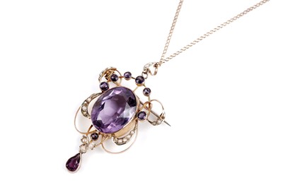 Lot 790 - An Edwardian amethyst and seed pearl brooch/pendant
