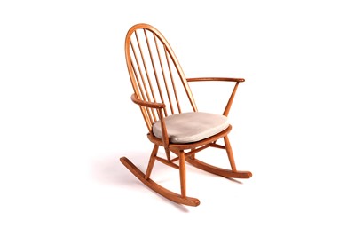 Lot 664 - An Ercol style rocking chair