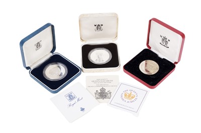 Lot 200 - Two Royal Mint silver proof coins; and a Golden Jubilee commemorative medal