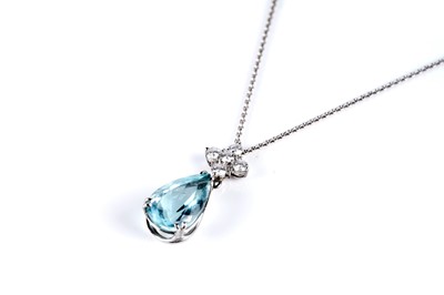Lot 795 - An aquamarine and diamond drop pendant