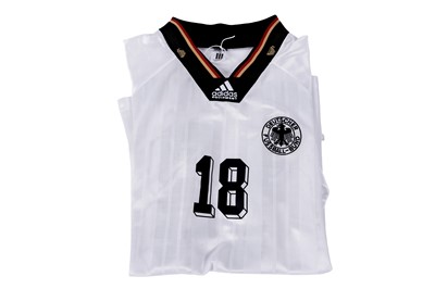 Lot 504 - An autographed Adidas retro German home strip