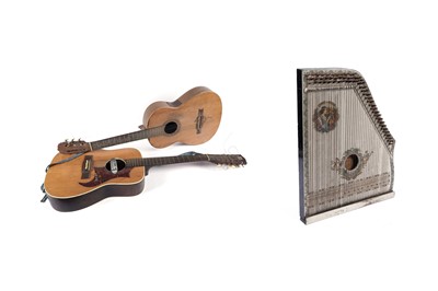 Lot 458 - A mandolin harp; and two guitars
