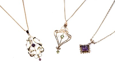 Lot 164 - An Edwardian amethyst and seed pearl pendant necklace; and two others