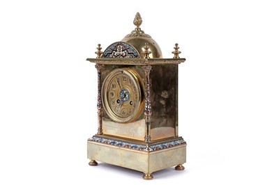 Lot 157 - Varon: a brass and champleve enamel cased mantel clock